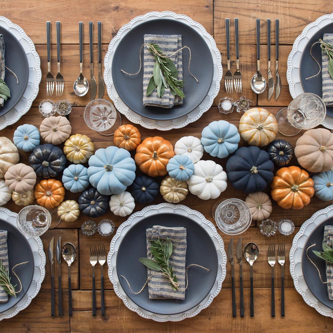 assortment of colored pumpkin decorations