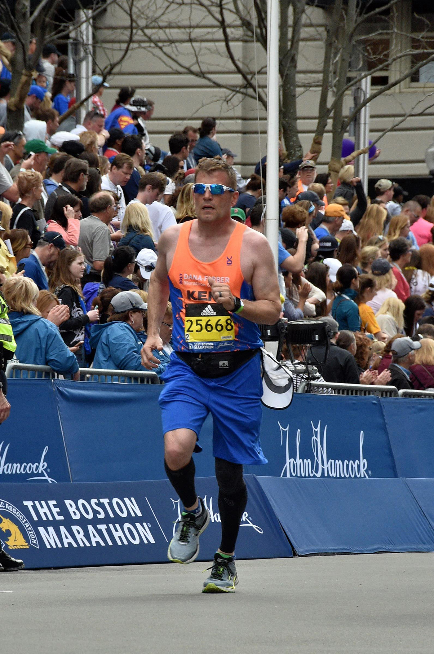 High-end builder running Boston Marathon