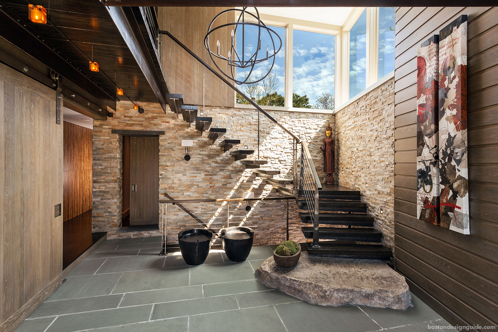 Contemporary staircase by Kistler & Knapp Builders