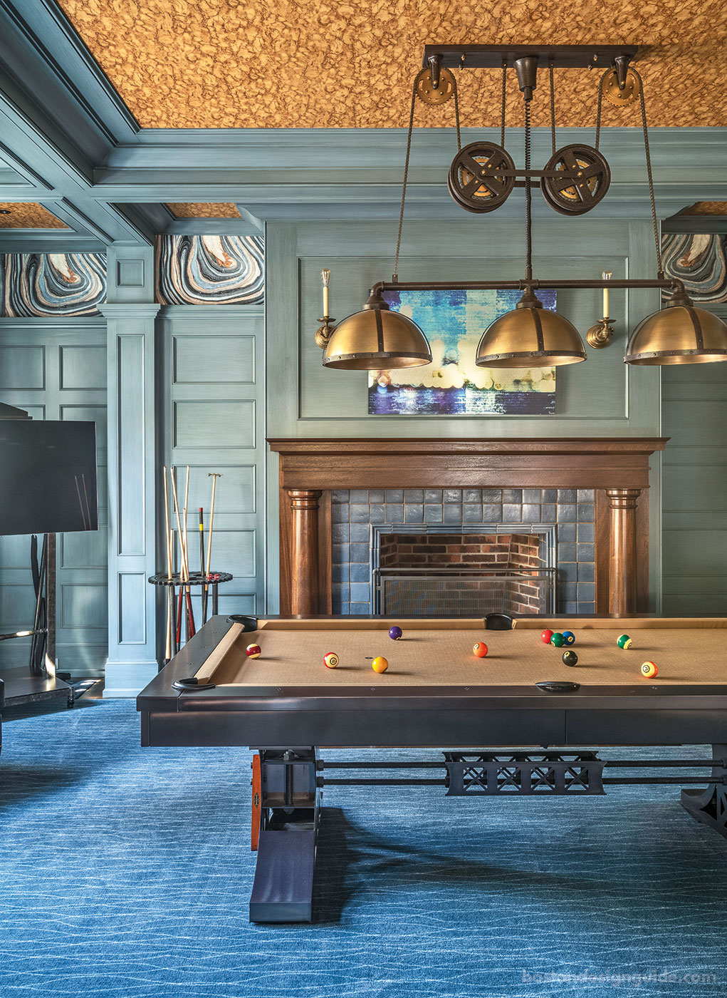 Blue billiards room with custom millwork