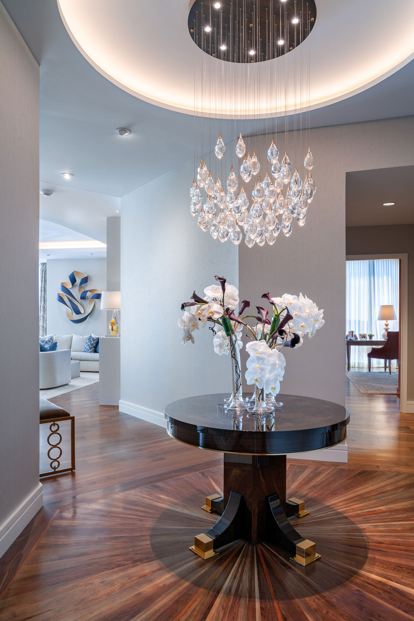 The breathtaking foyer of a new residence in One Dalton, Four Seasons Hotel and Private Residences designed by Carter & Company