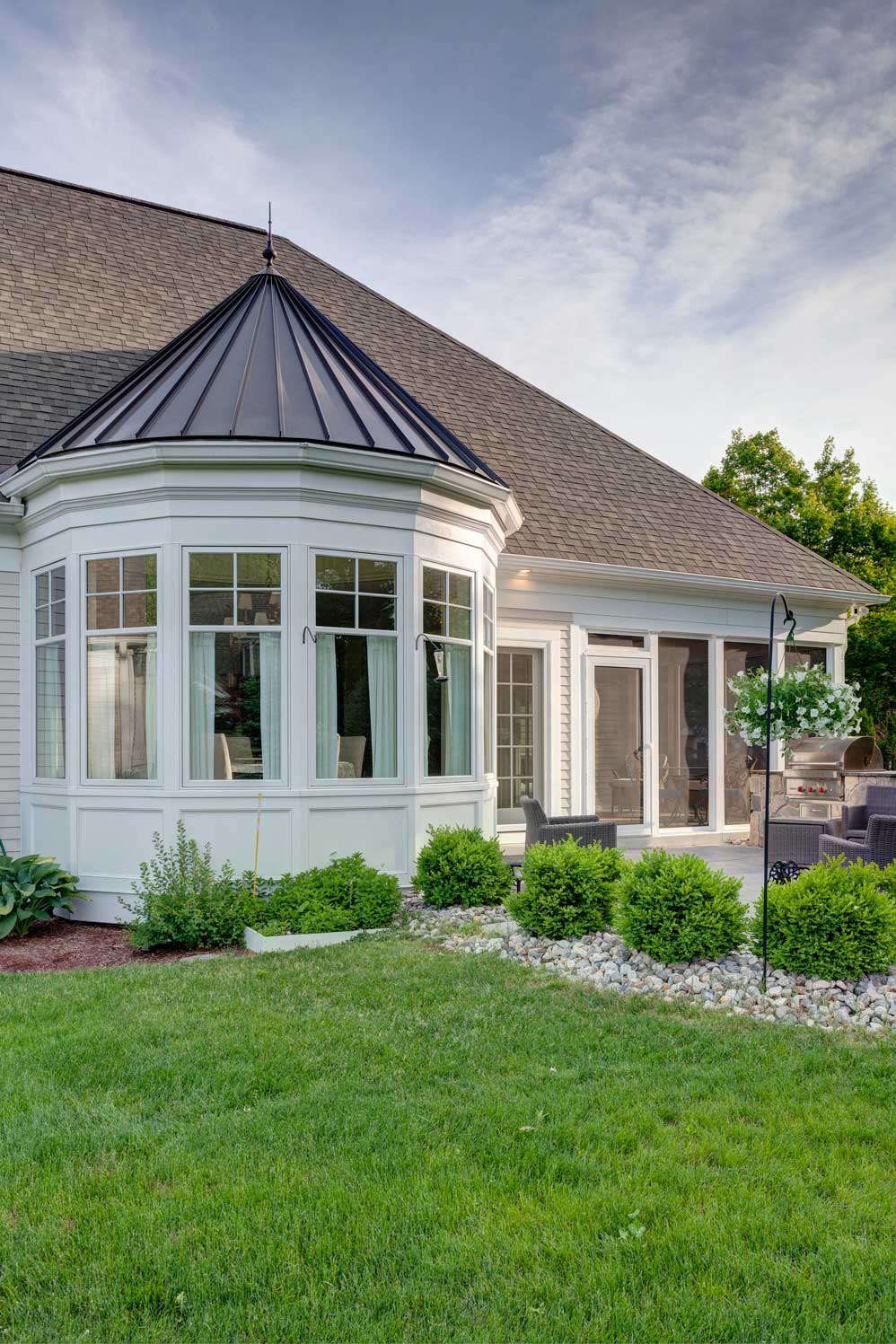 backyard view of home with circular room