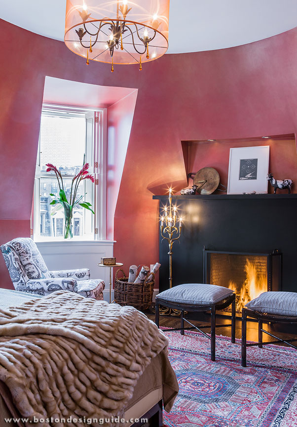 Red bedroom in a historic renovation by S+H Construction