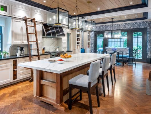 Farmhouse kitchen with big center island and wood ceiling