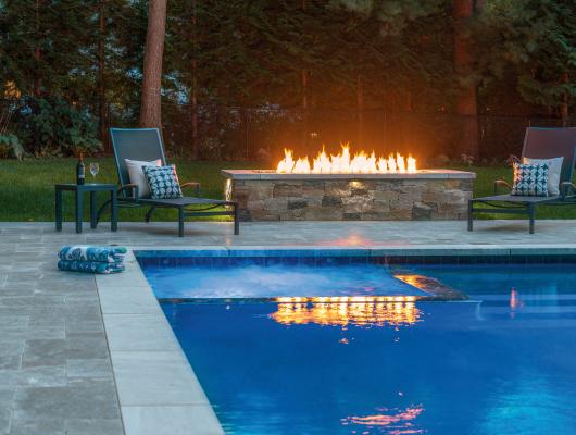 Marble Terrace and Fire Feature by Boston landscape professional Onyx Corporation