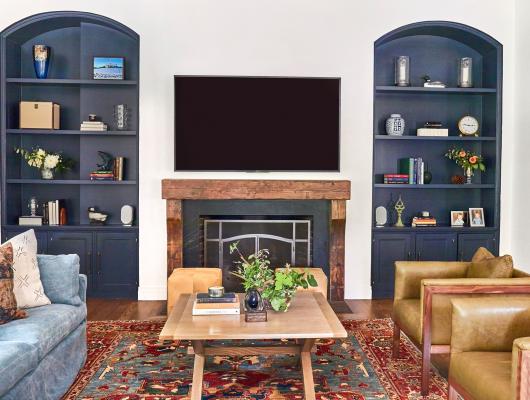 living room with blue bookshelves