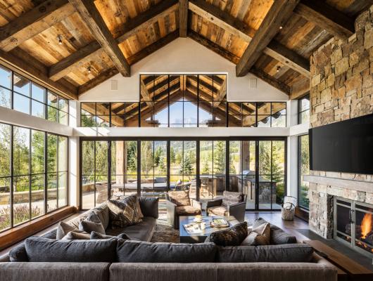 Family room with floor to ceiling windows