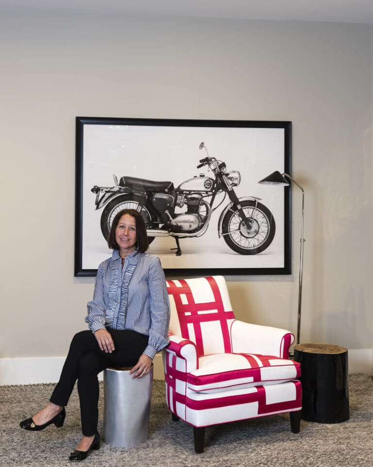 Elizabeth Benedict of Elizabeth Home Décor & Design with her chair “Charlotte’s Web”